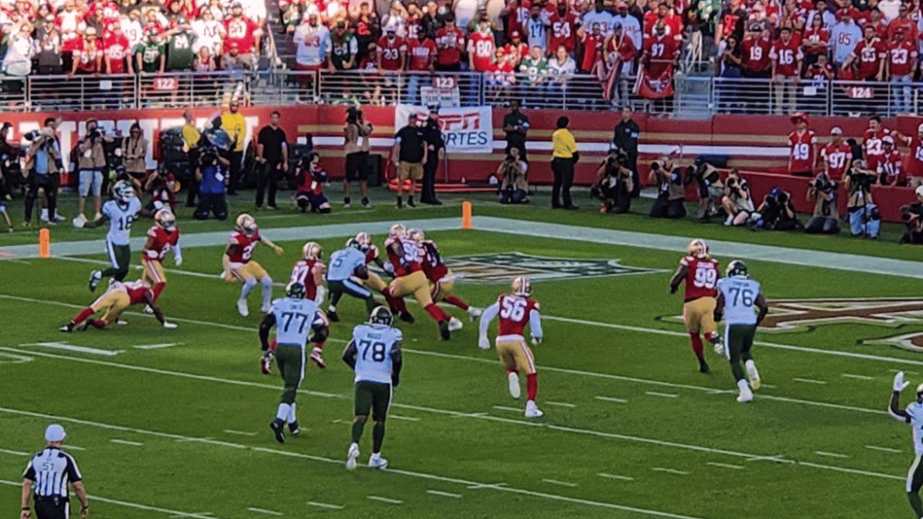 NFL game is being played in a stadium